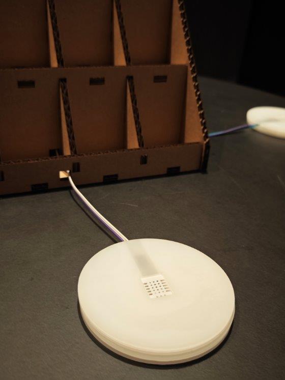 Acrylic sensor coaster connected to the tea display